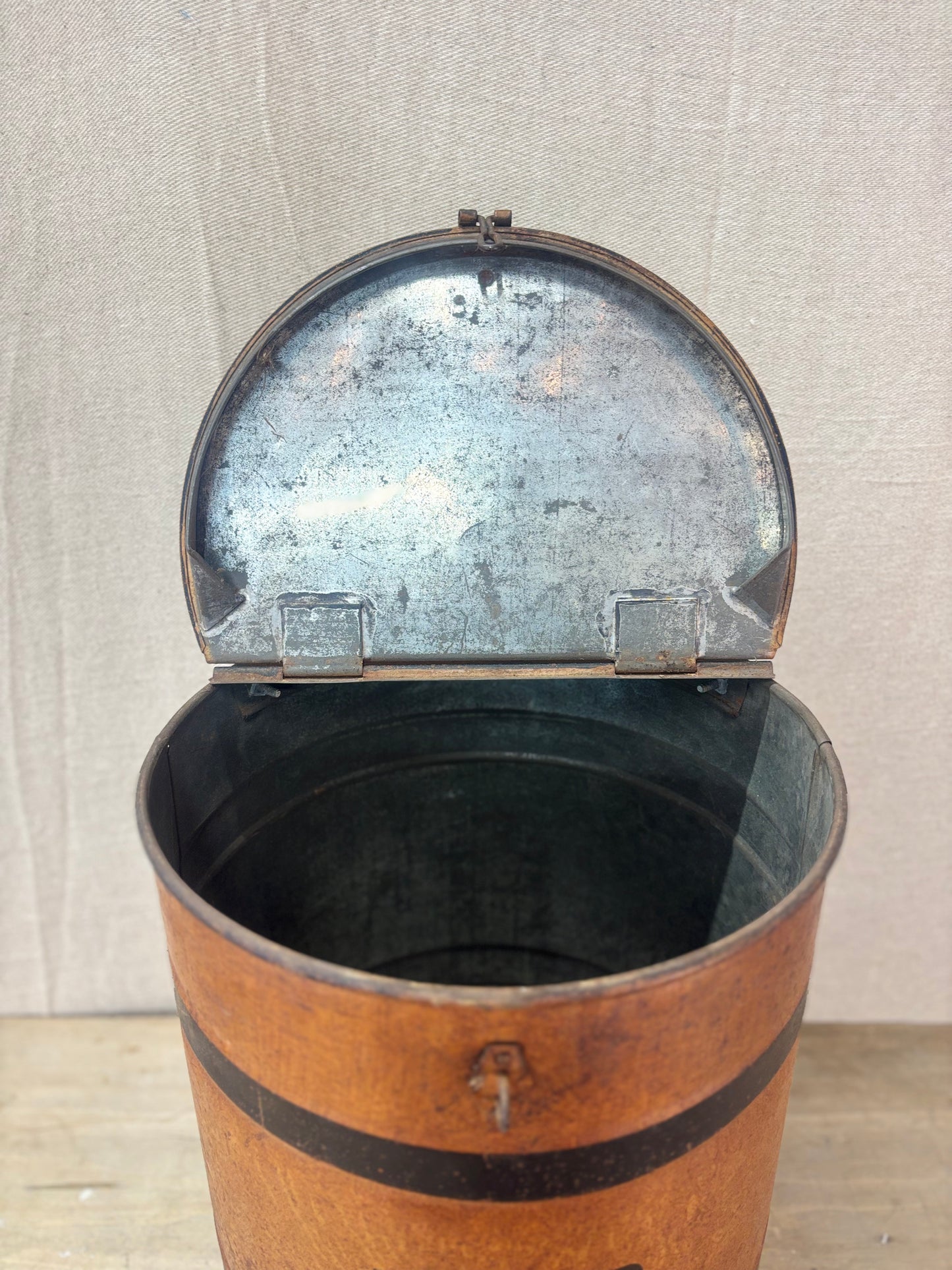 An open antique Tin Flour Bin on a plain background.