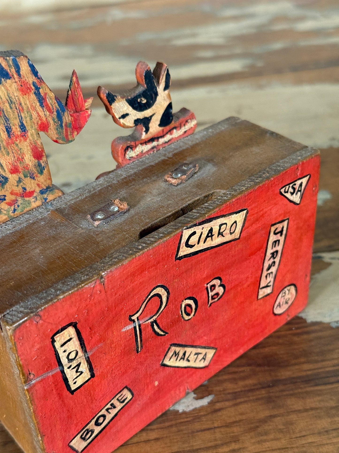 Hand-crafted folk art wooden clown money box