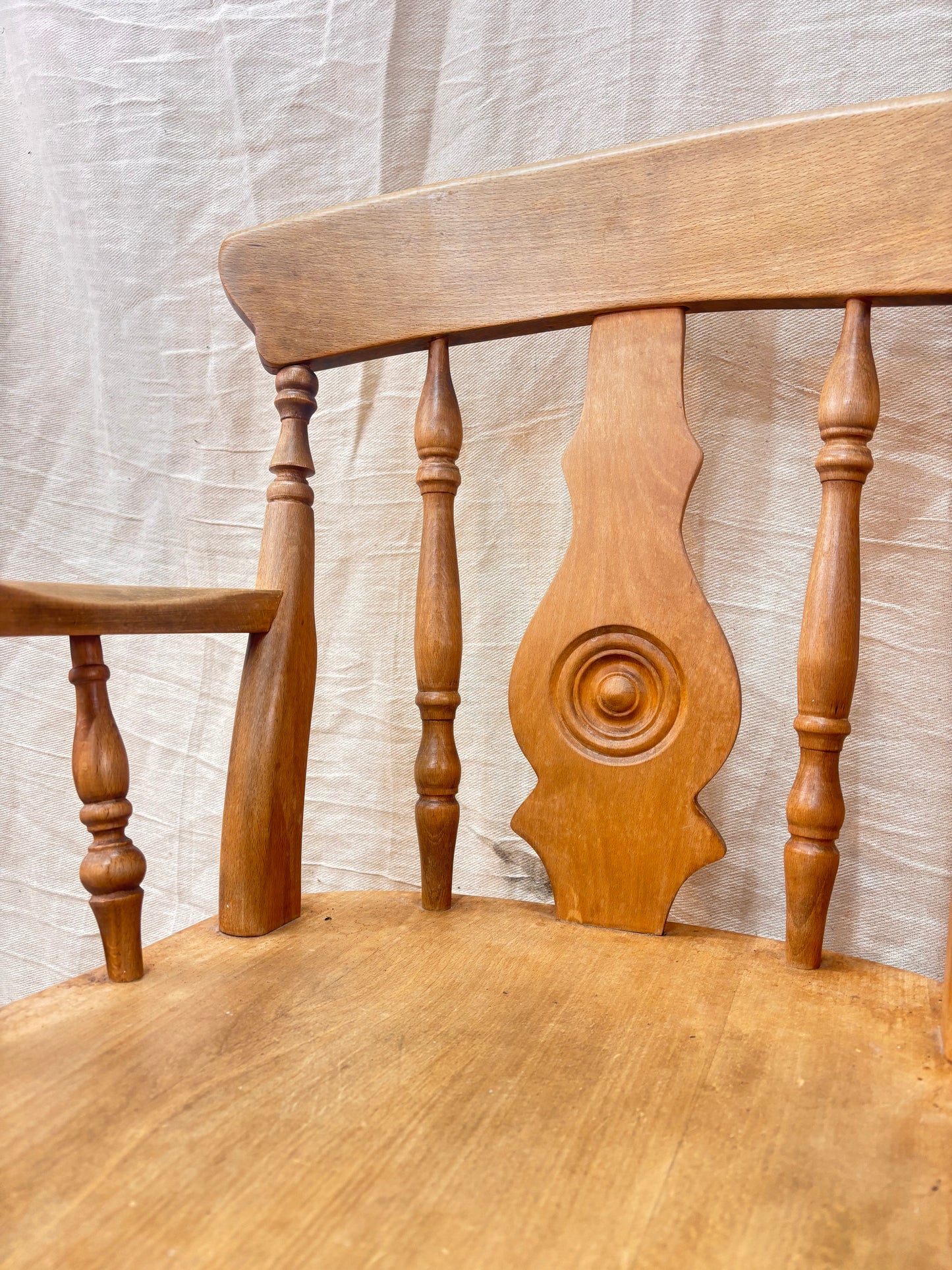 carved detail on a wooden chair