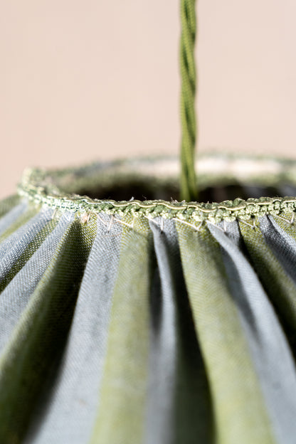 Handmade 12-inch linen carousel shade with sage green and soft blue stripes, vintage trim and pendant fitting. Cosy cottage style.