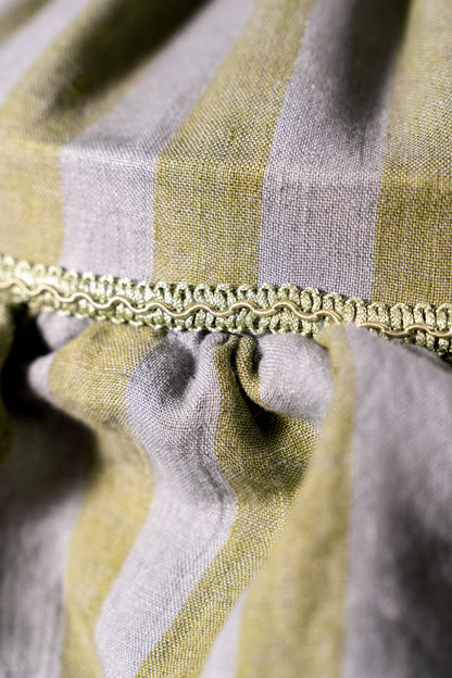 Handmade 12-inch linen carousel shade with sage green and soft blue stripes, vintage trim and pendant fitting. Cosy cottage style.