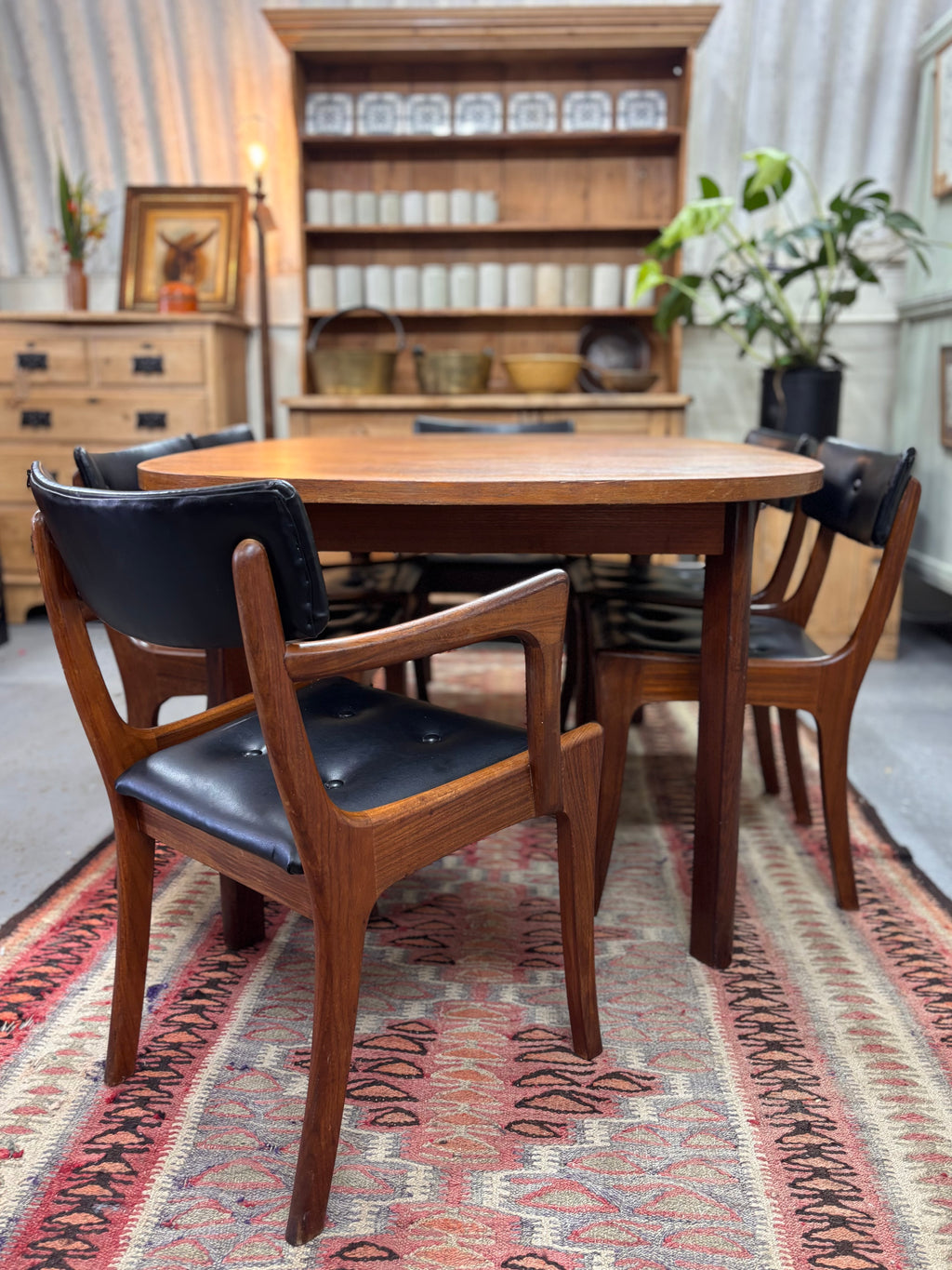 G Plan teak dining suite complete with an oval table and 6 sculptural chairs