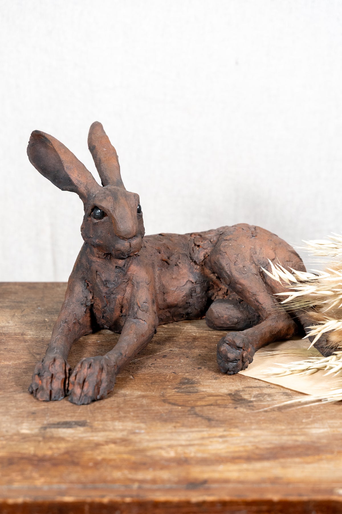 A beautiful original sculpture of a hare by Norfolk ceramic artist Wendy Barlow.