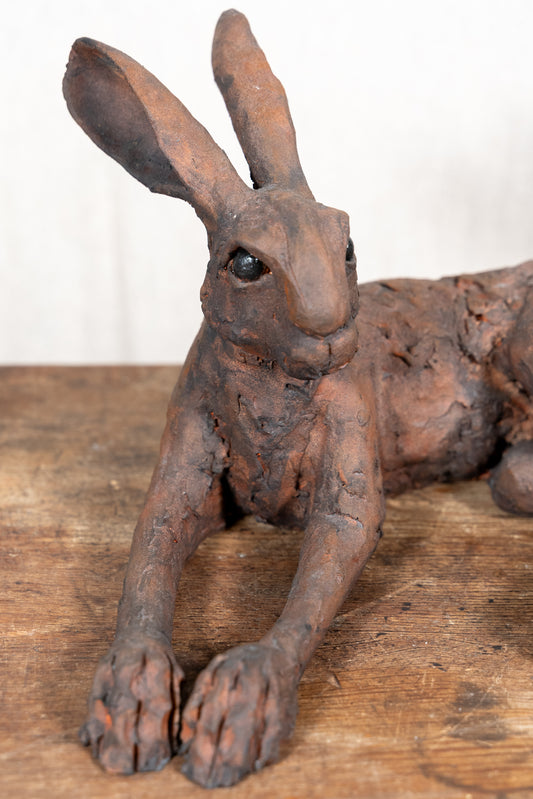 A beautiful original sculpture of a hare by Norfolk ceramic artist Wendy Barlow.