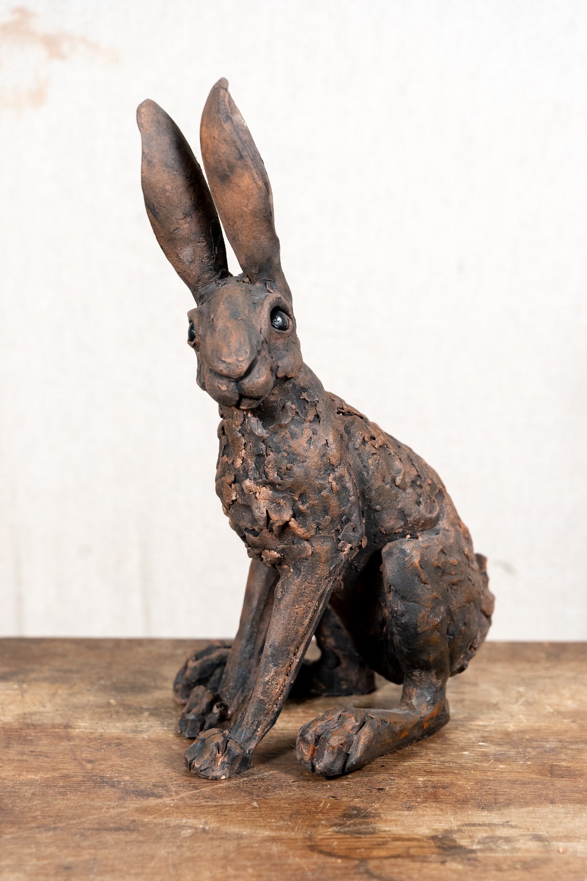 A beautiful original sculpture of a hare by Norfolk ceramic artist Wendy Barlow.
