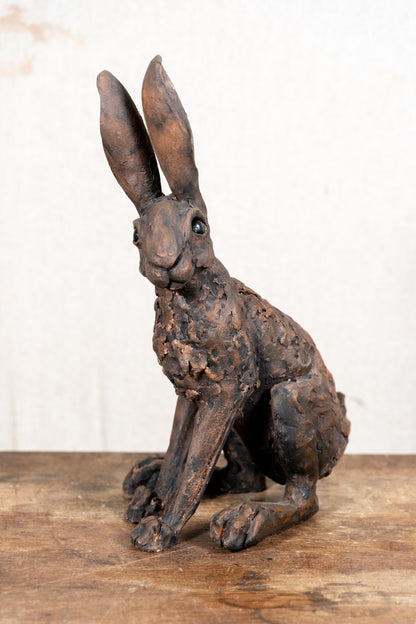 A beautiful original sculpture of a hare by Norfolk ceramic artist Wendy Barlow.