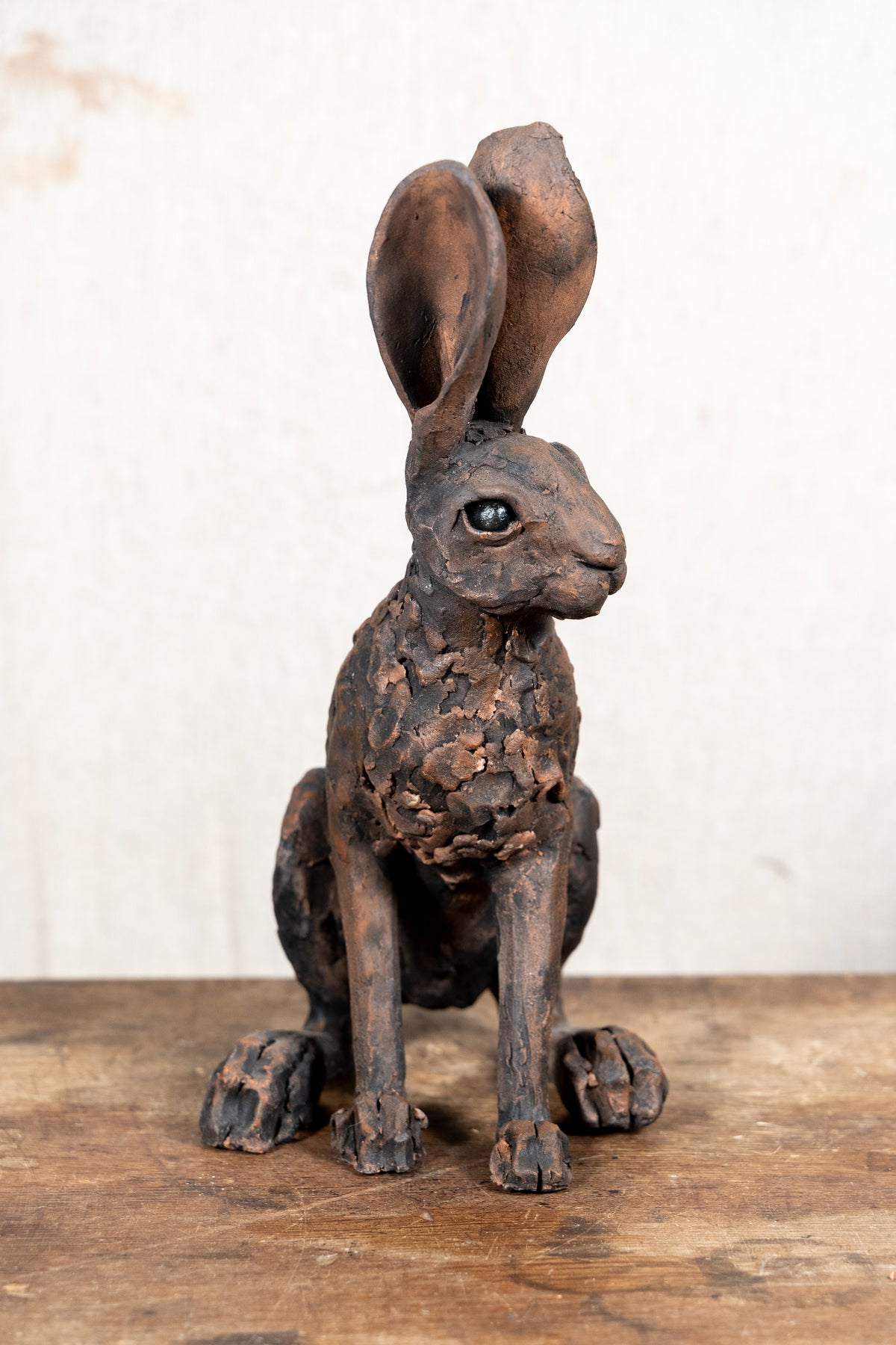 A beautiful original sculpture of a hare by Norfolk ceramic artist Wendy Barlow.