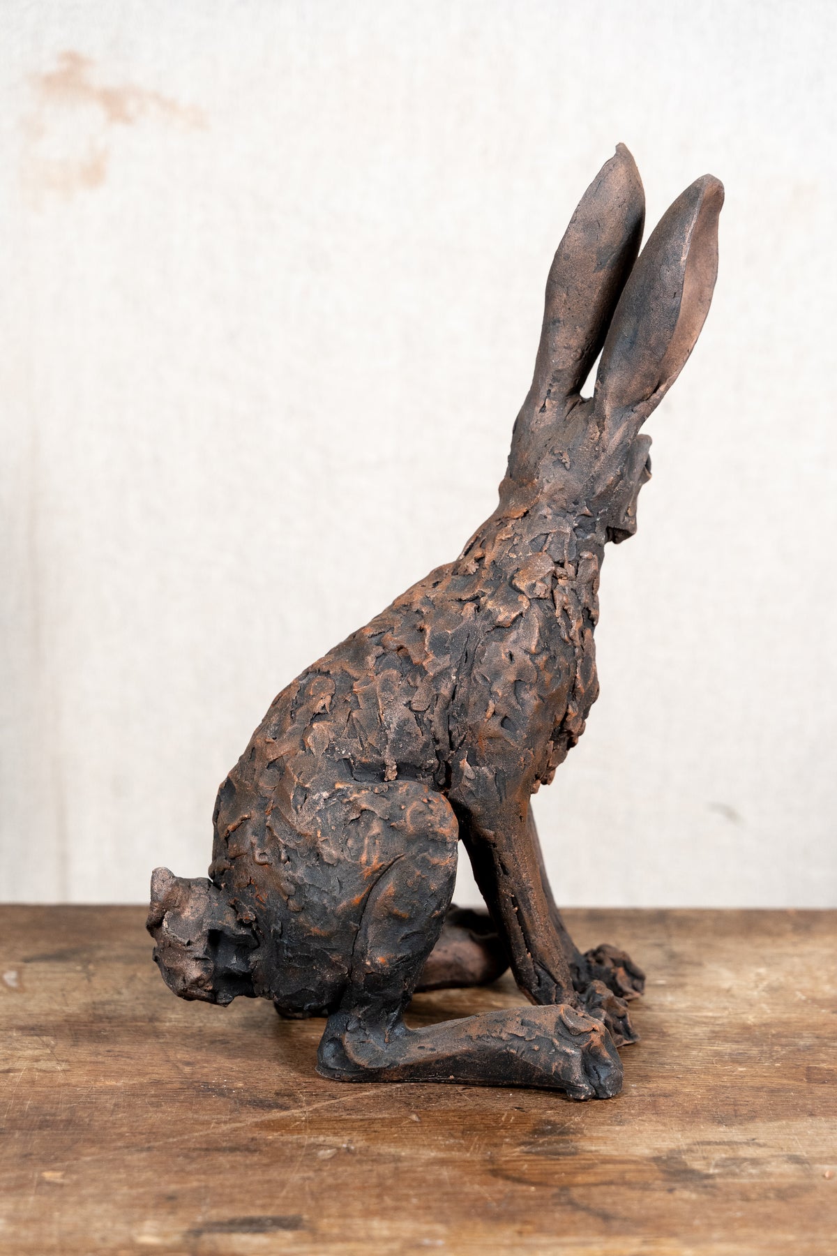 A beautiful original sculpture of a hare by Norfolk ceramic artist Wendy Barlow.