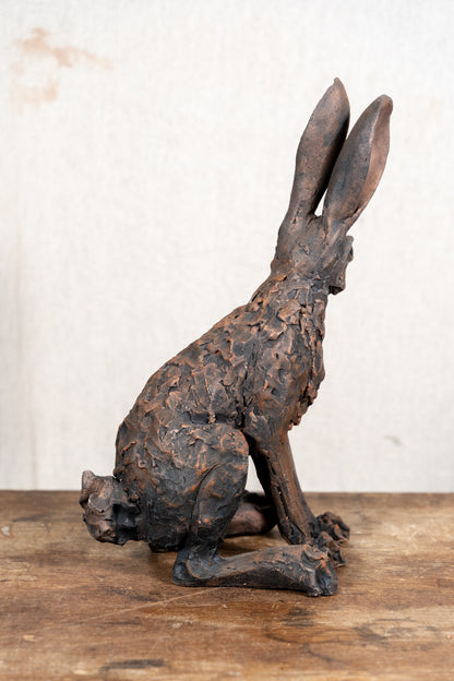 A beautiful original sculpture of a hare by Norfolk ceramic artist Wendy Barlow.