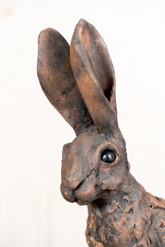 A beautiful original sculpture of a hare by Norfolk ceramic artist Wendy Barlow.