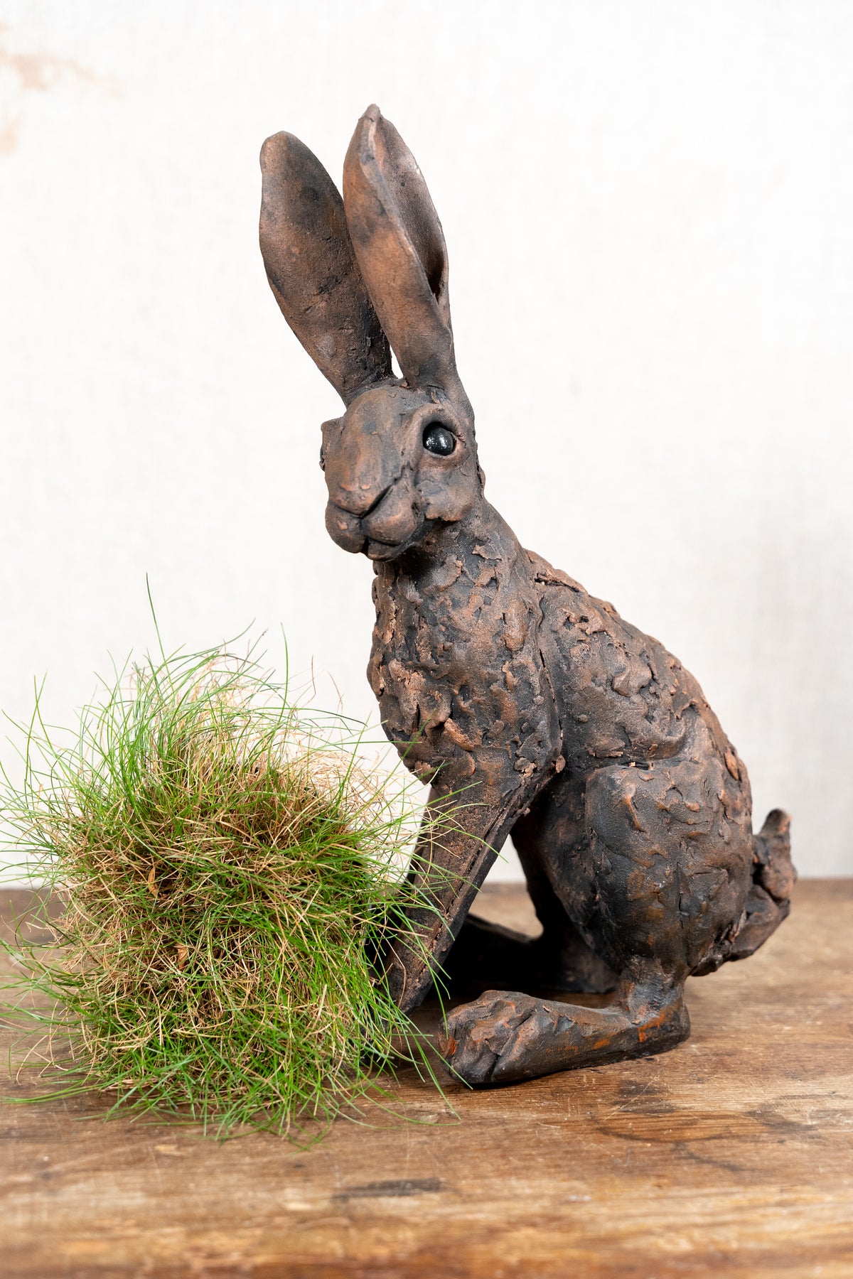 A beautiful original sculpture of a hare by Norfolk ceramic artist Wendy Barlow.