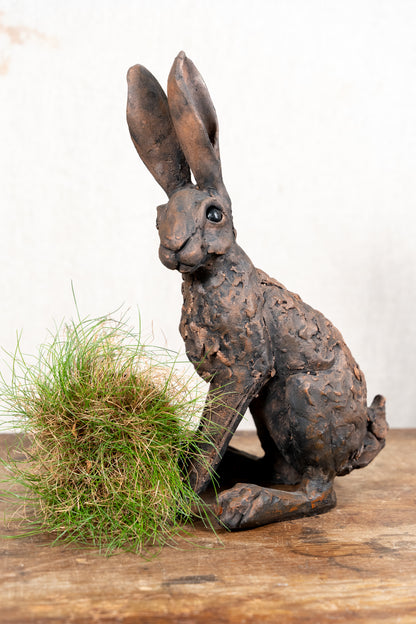 A beautiful original sculpture of a hare by Norfolk ceramic artist Wendy Barlow.