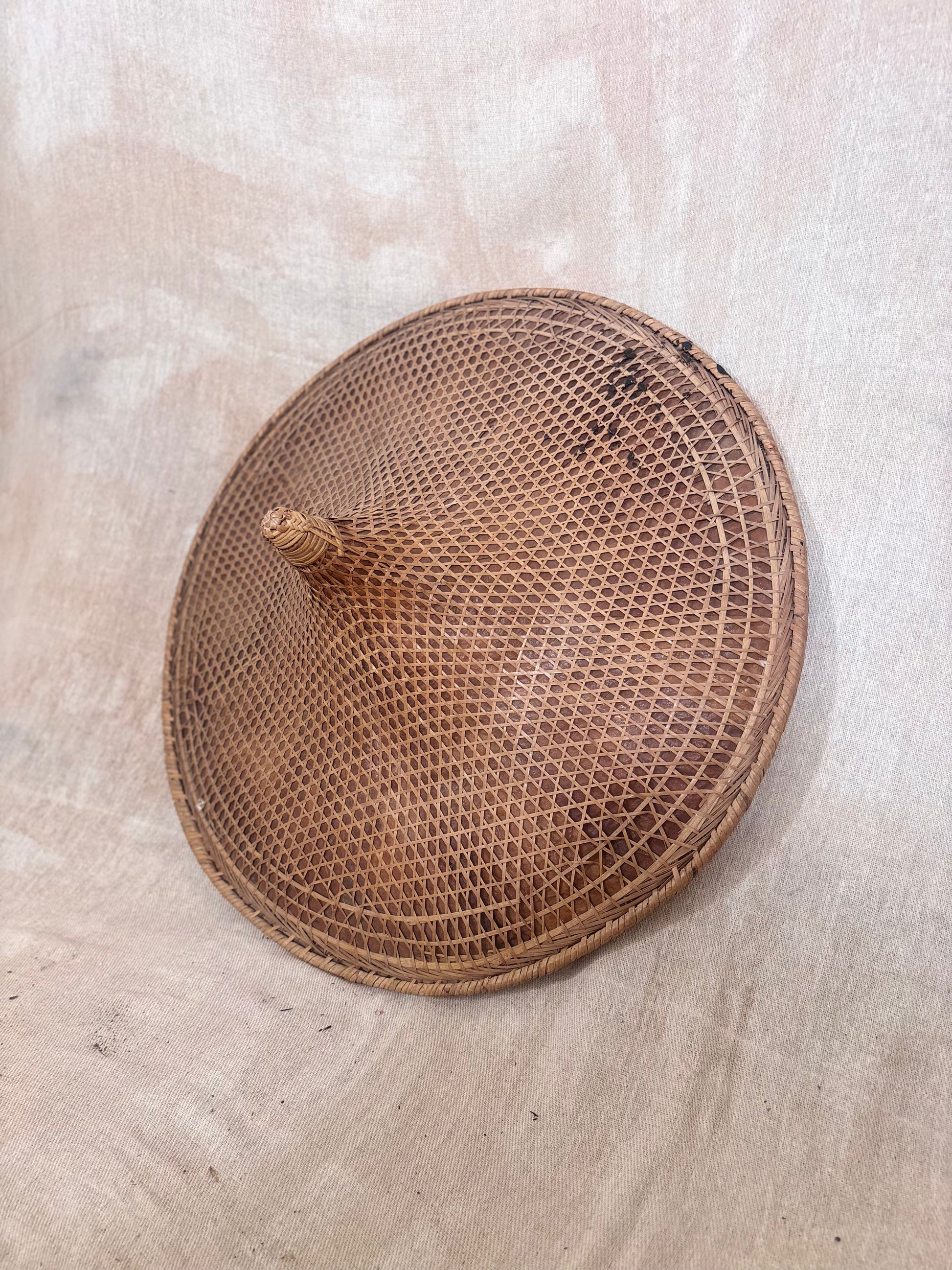 Vintage Asian conical hat with original Royal Air Force cabin identification tag attached, woven natural fibre hat with RAF Brize Norton luggage label.