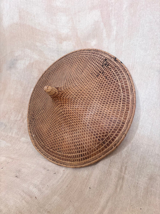 Vintage Asian conical hat with original Royal Air Force cabin identification tag attached, woven natural fibre hat with RAF Brize Norton luggage label.