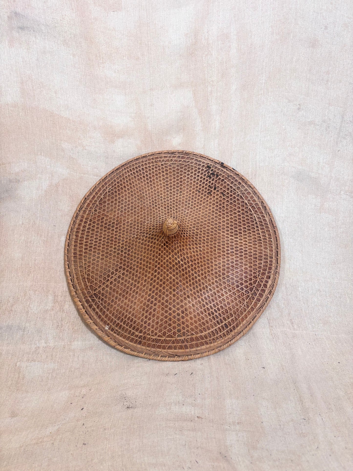 Vintage Asian conical hat with original Royal Air Force cabin identification tag attached, woven natural fibre hat with RAF Brize Norton luggage label.
