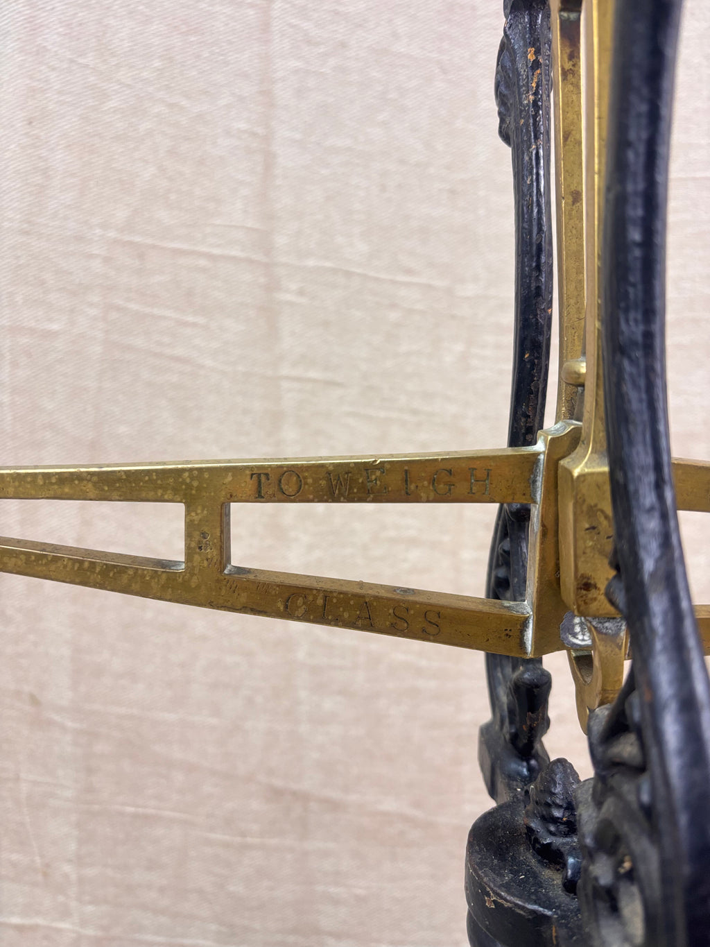 19th century W & T Avery Patent Agate Balance beam scale in brass and cast iron, photographed against a cream backdrop.