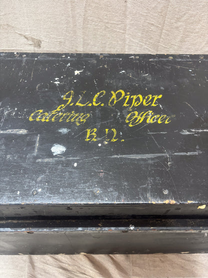 Black box with gold text on a light gray background