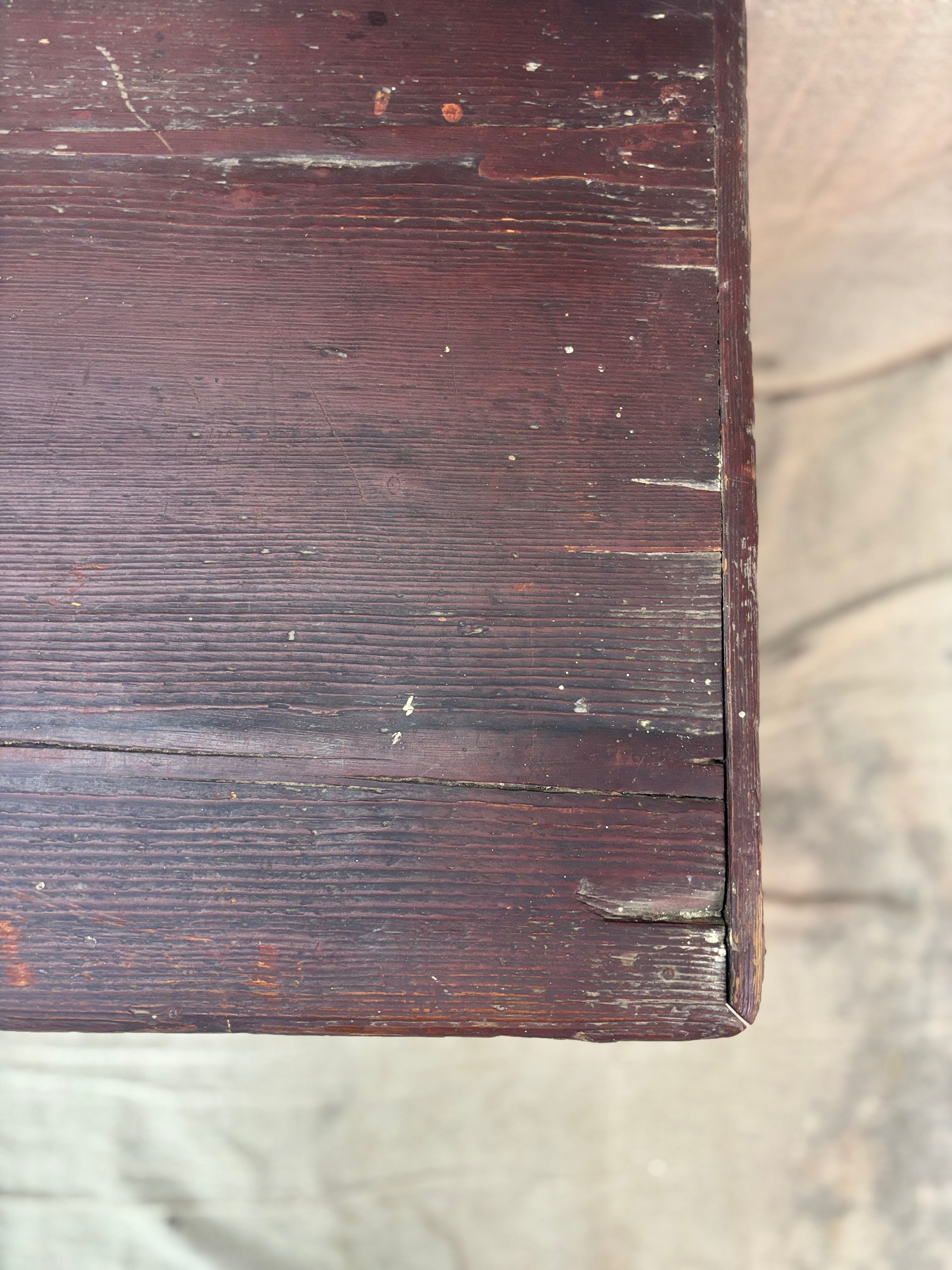 Close-up of a wooden surface with visible grain and wear