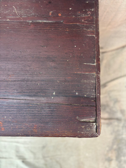 Close-up of a wooden surface with visible grain and wear