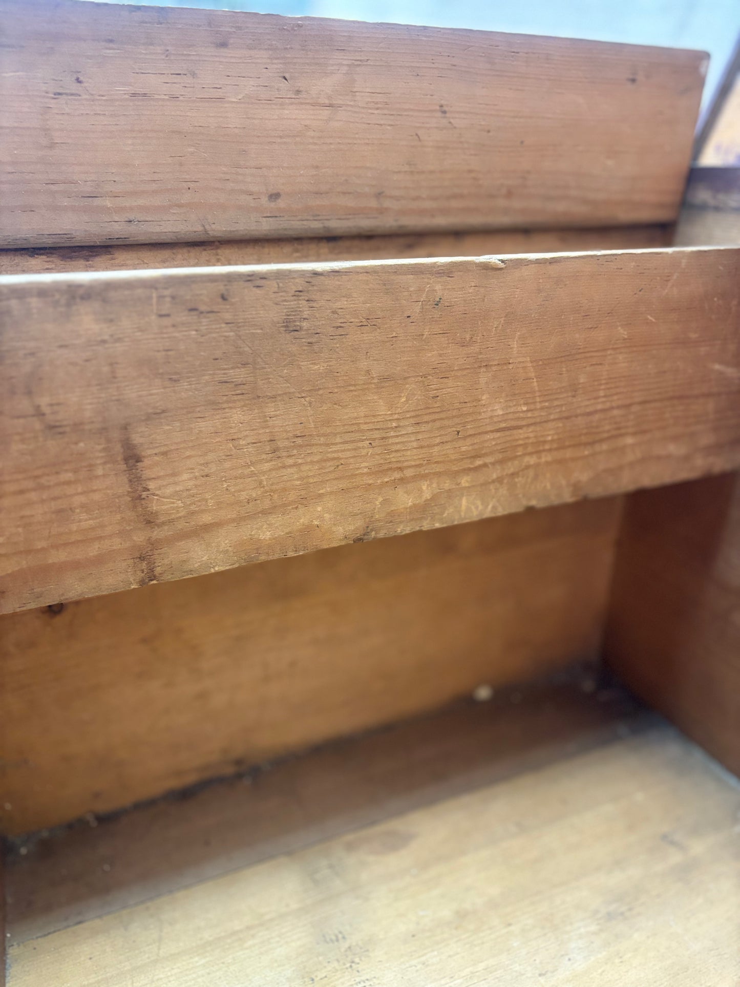 Close-up of a wooden box with visible grain and texture