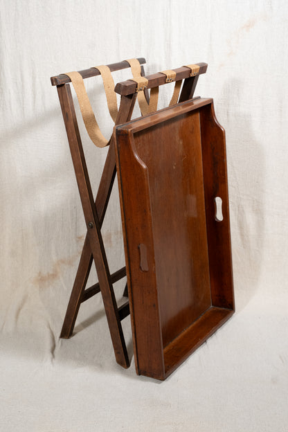 Classic wooden butler's tray with raised gallery, pierced carrying handles and folding X-frame stand. A versatile serving and occasional table.