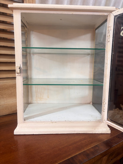 White painted metal Cadburys chocolate display cabinet with glass front, original lettering and aged patina.
