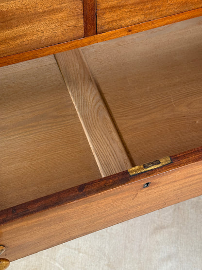 Close-up of a wooden door with a hinge