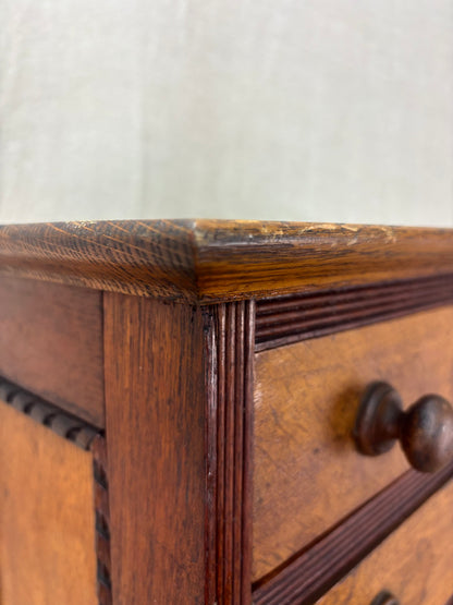 Close-up of a wooden drawer with a white background