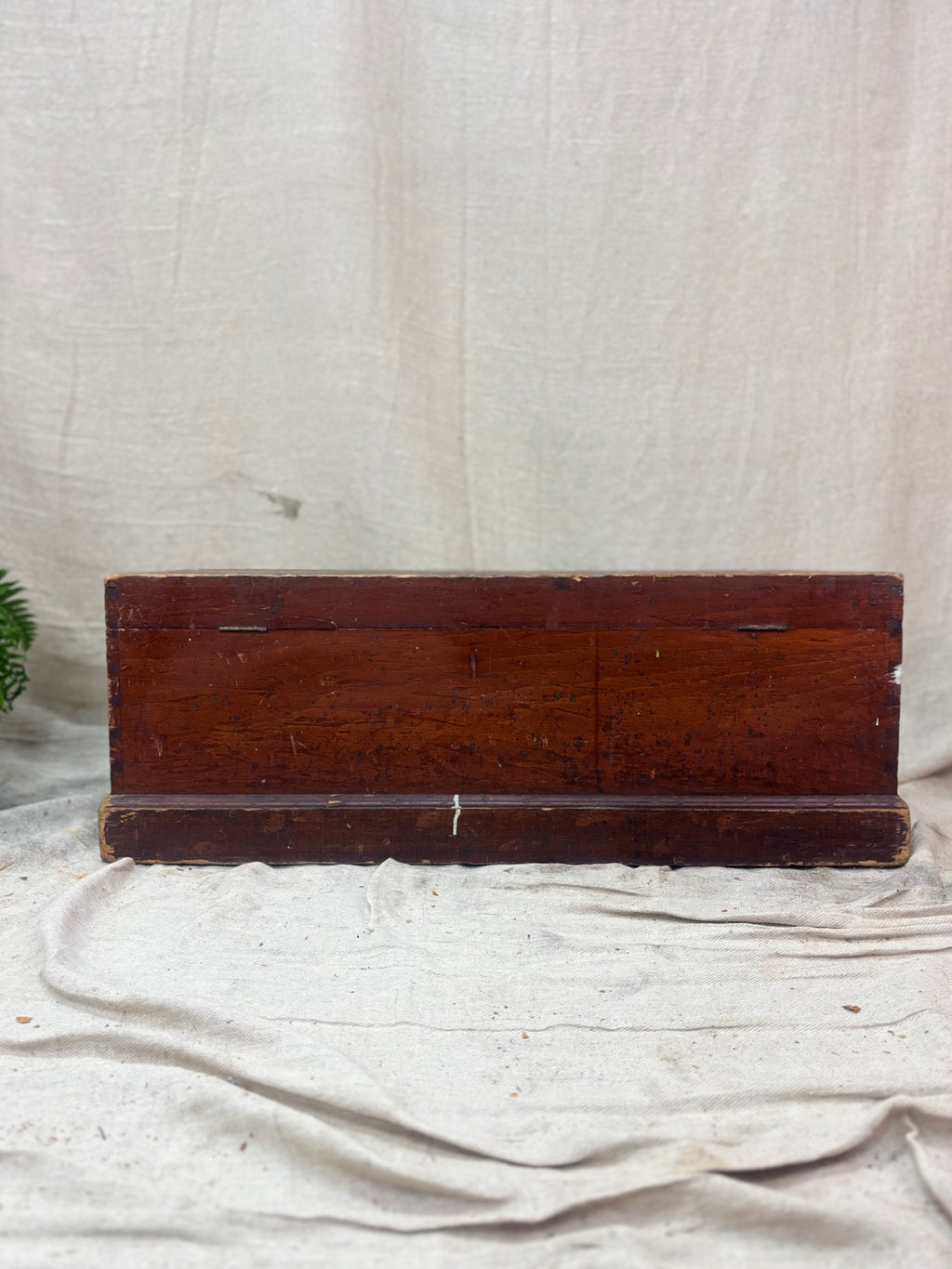 Wooden sign on a textured white background