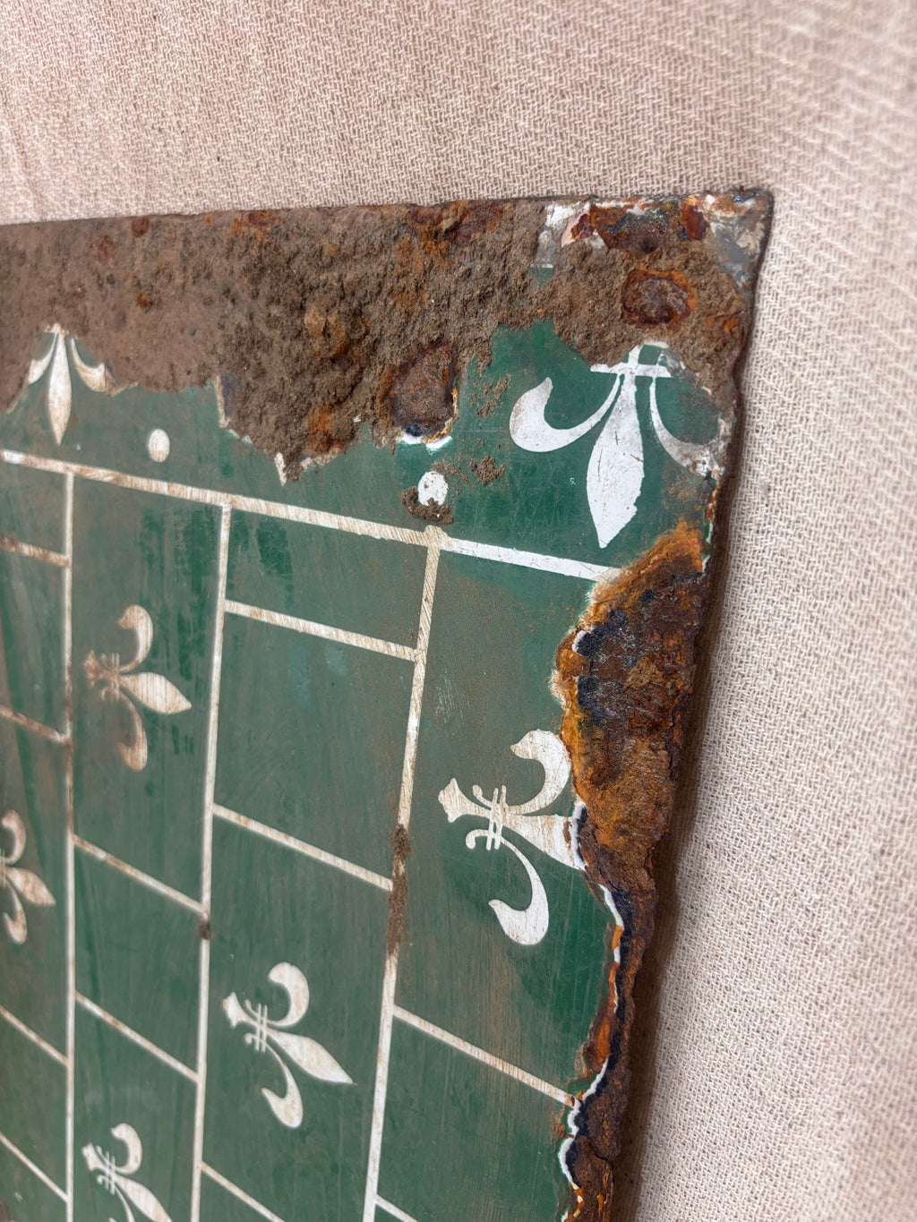 Rustic corner of a tiled surface with decorative elements on a beige background