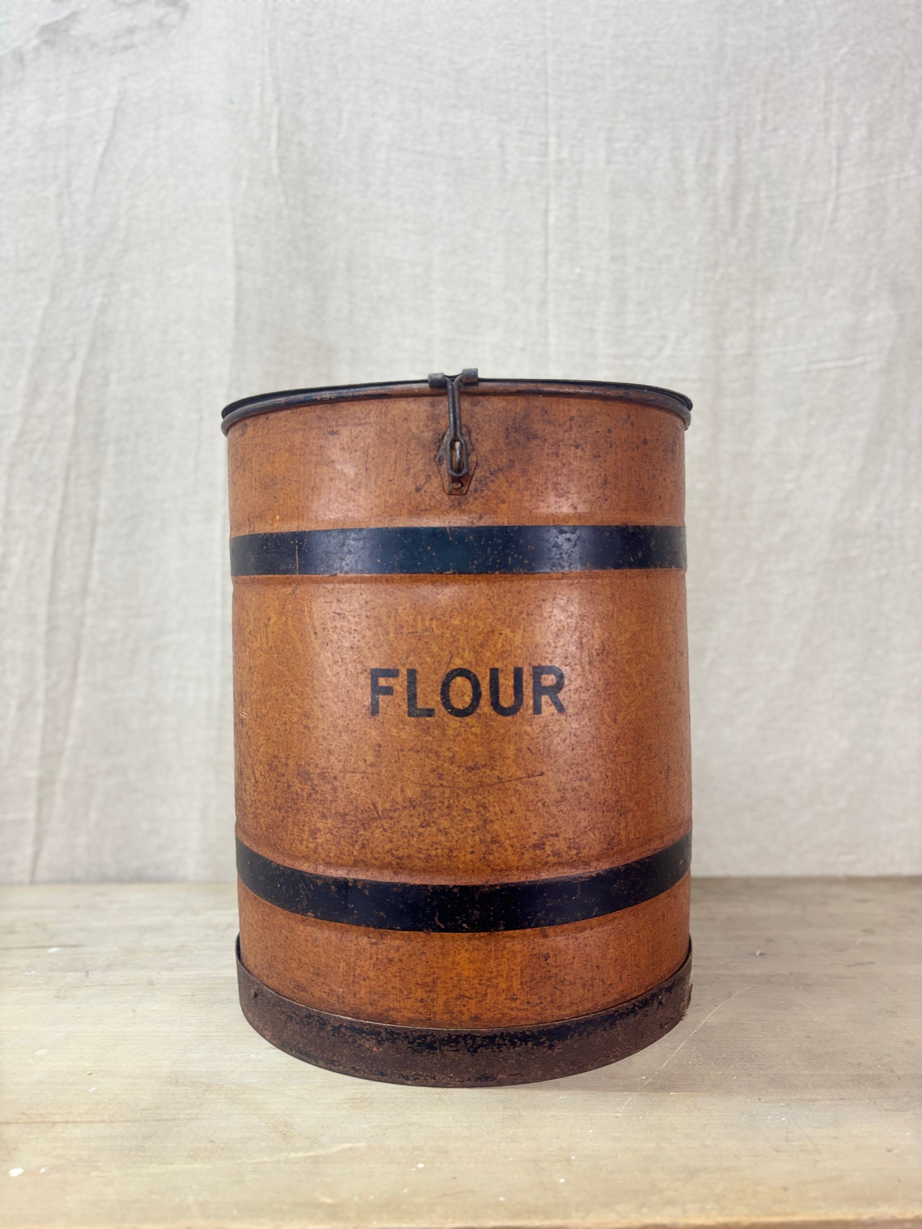 An antique Tin Flour Bin on a plain background. 