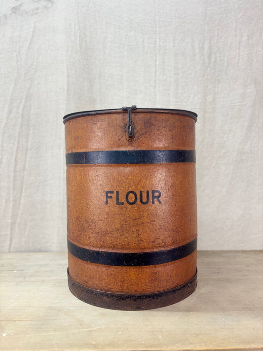 An antique Tin Flour Bin on a plain background. 