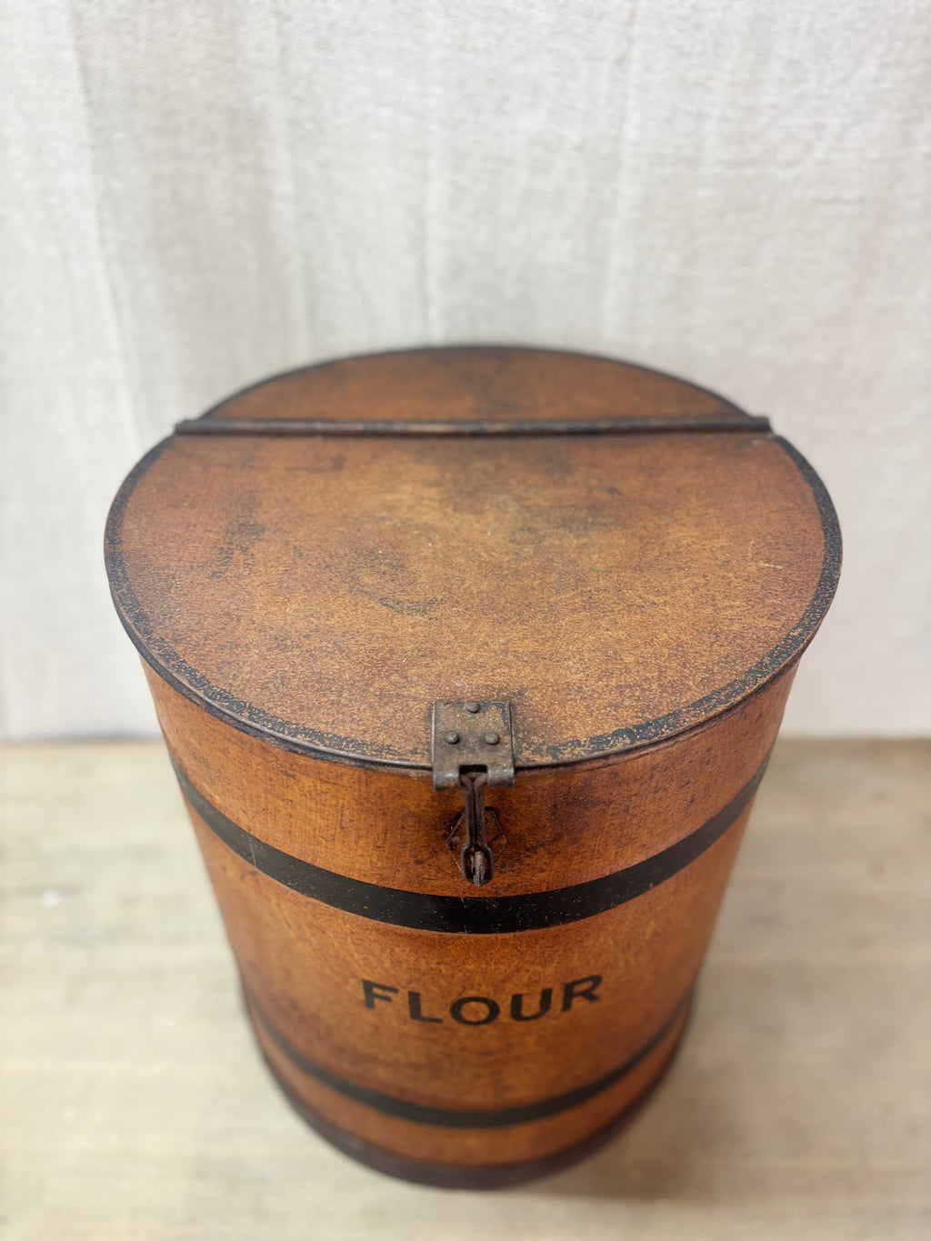 An antique Tin Flour Bin on a plain background. 