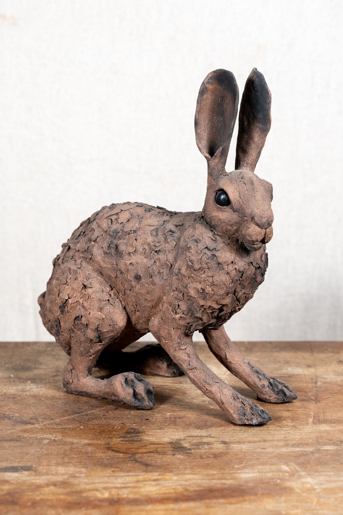 A beautiful original ceramic sculpture of a hare by Norfolk ceramic artist Wendy Barlow.