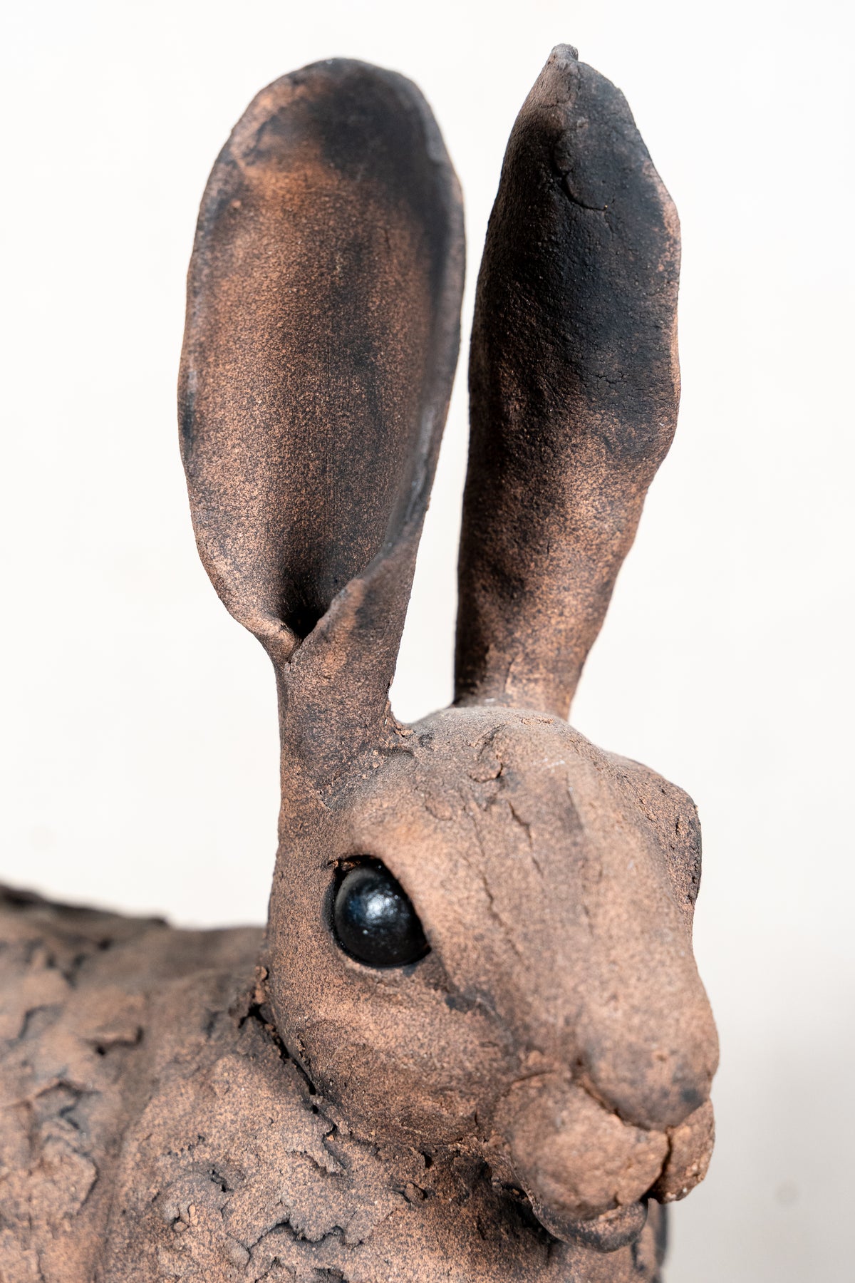 A beautiful original ceramic sculpture of a hare by Norfolk ceramic artist Wendy Barlow.