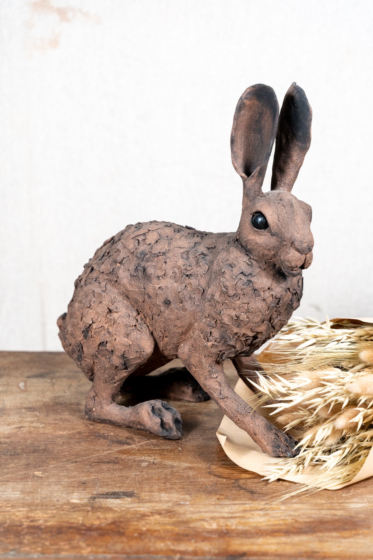 A beautiful original ceramic sculpture of a hare by Norfolk ceramic artist Wendy Barlow.