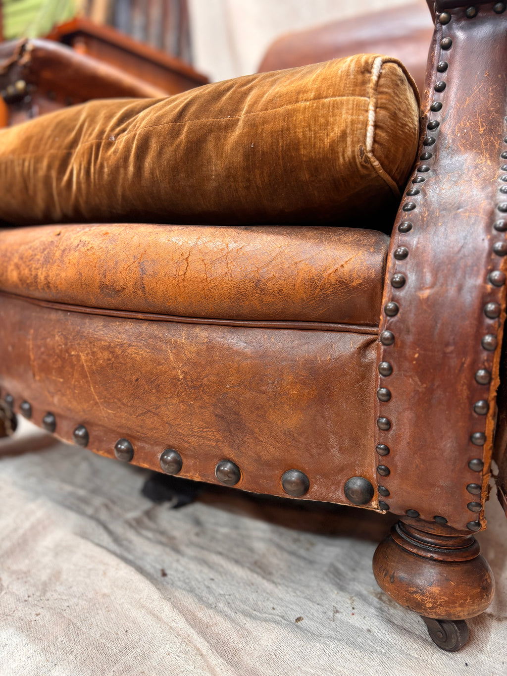 A Pair of Brown Leather Club Chairs.
