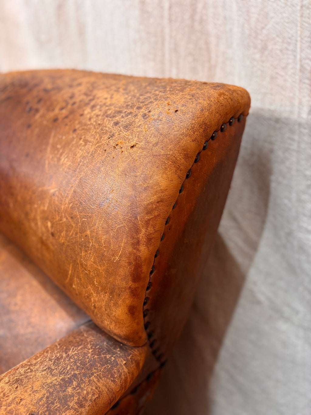 A Pair of Brown Leather Club Chairs.
