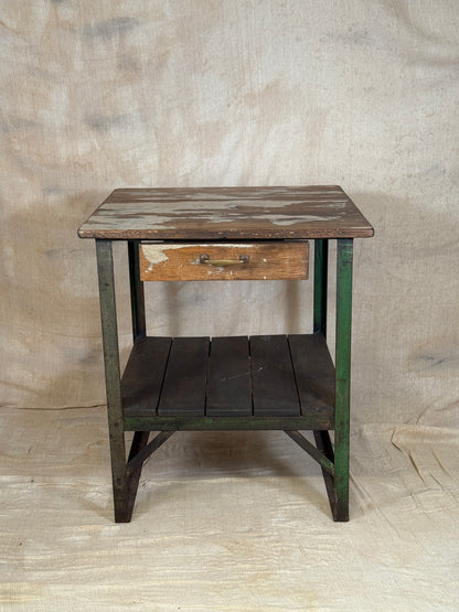 A rustic industrial wooden and metal table.
