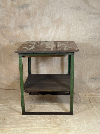 A rustic industrial wooden and metal table.