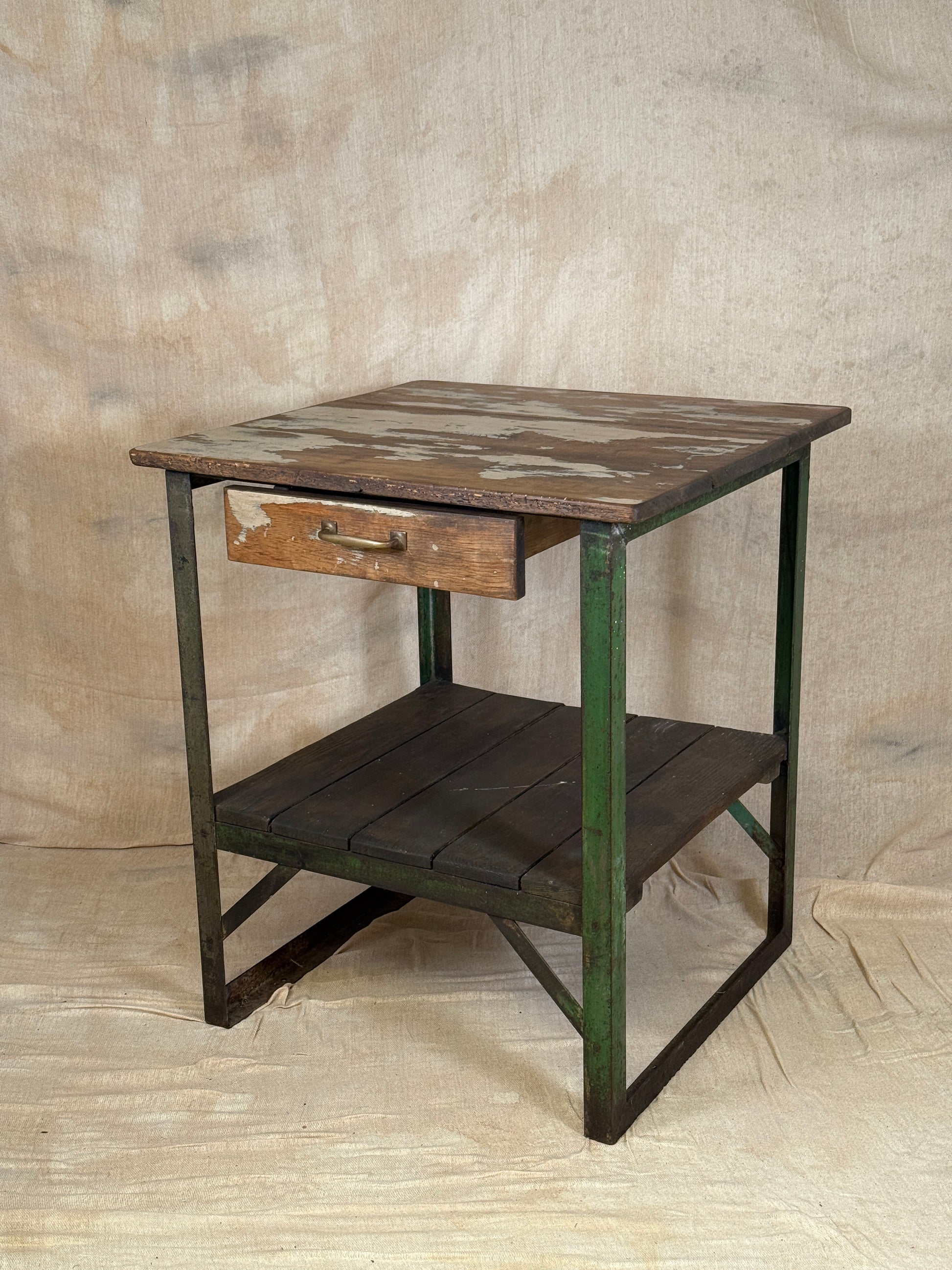 A rustic industrial wooden and metal table.