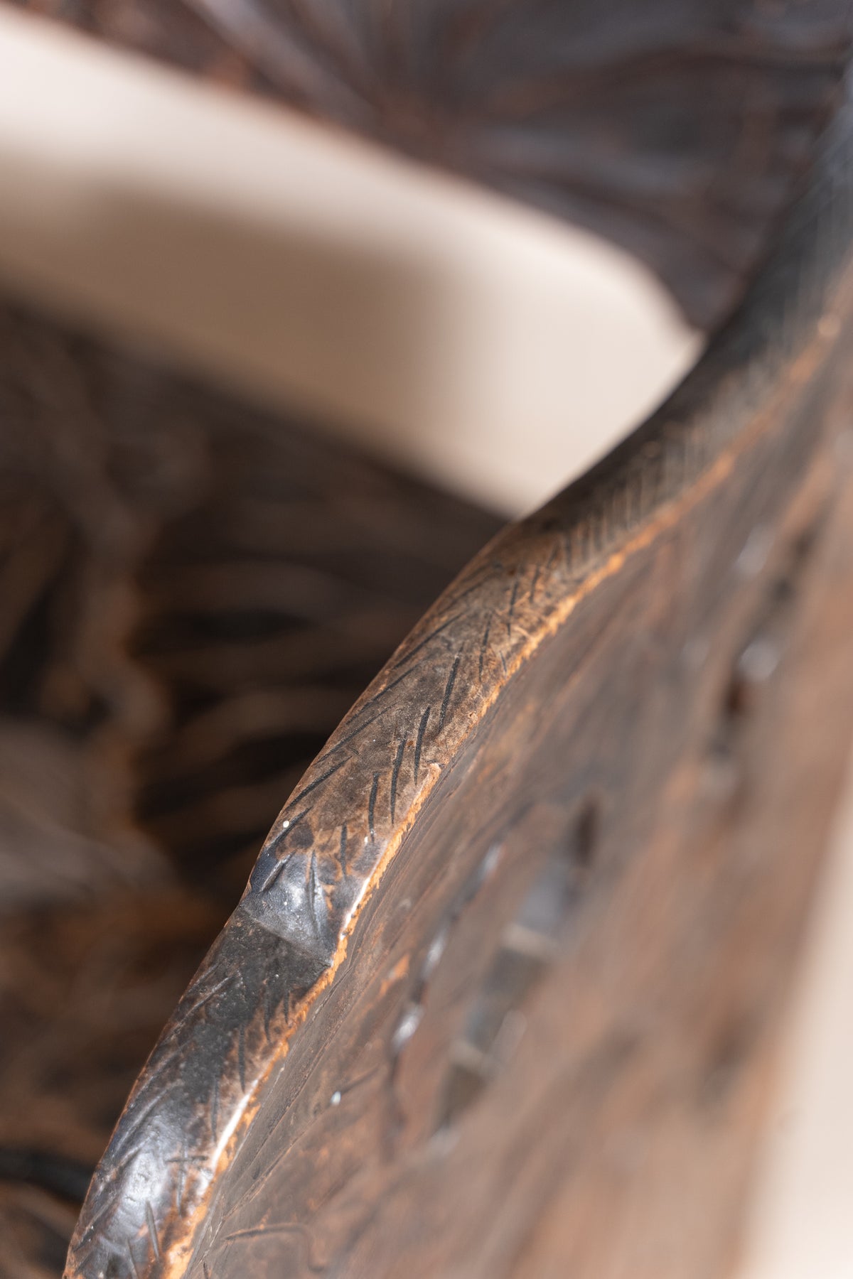 Liberty & Co. Japanese carved hardwood bench, circa 1900–1910, featuring pierced floral panels and intricate decoration from the Arts and Crafts period.