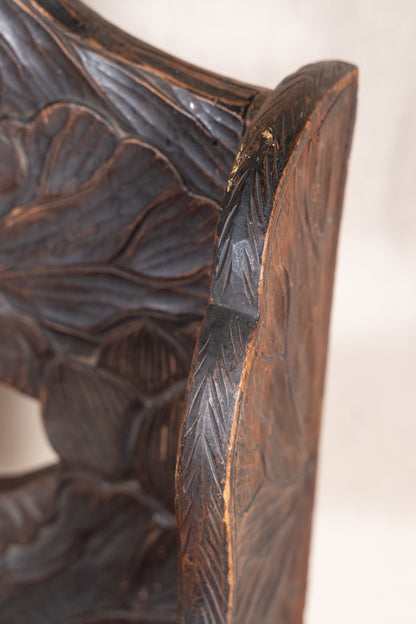 Liberty & Co. Japanese carved hardwood bench, circa 1900–1910, featuring pierced floral panels and intricate decoration from the Arts and Crafts period.