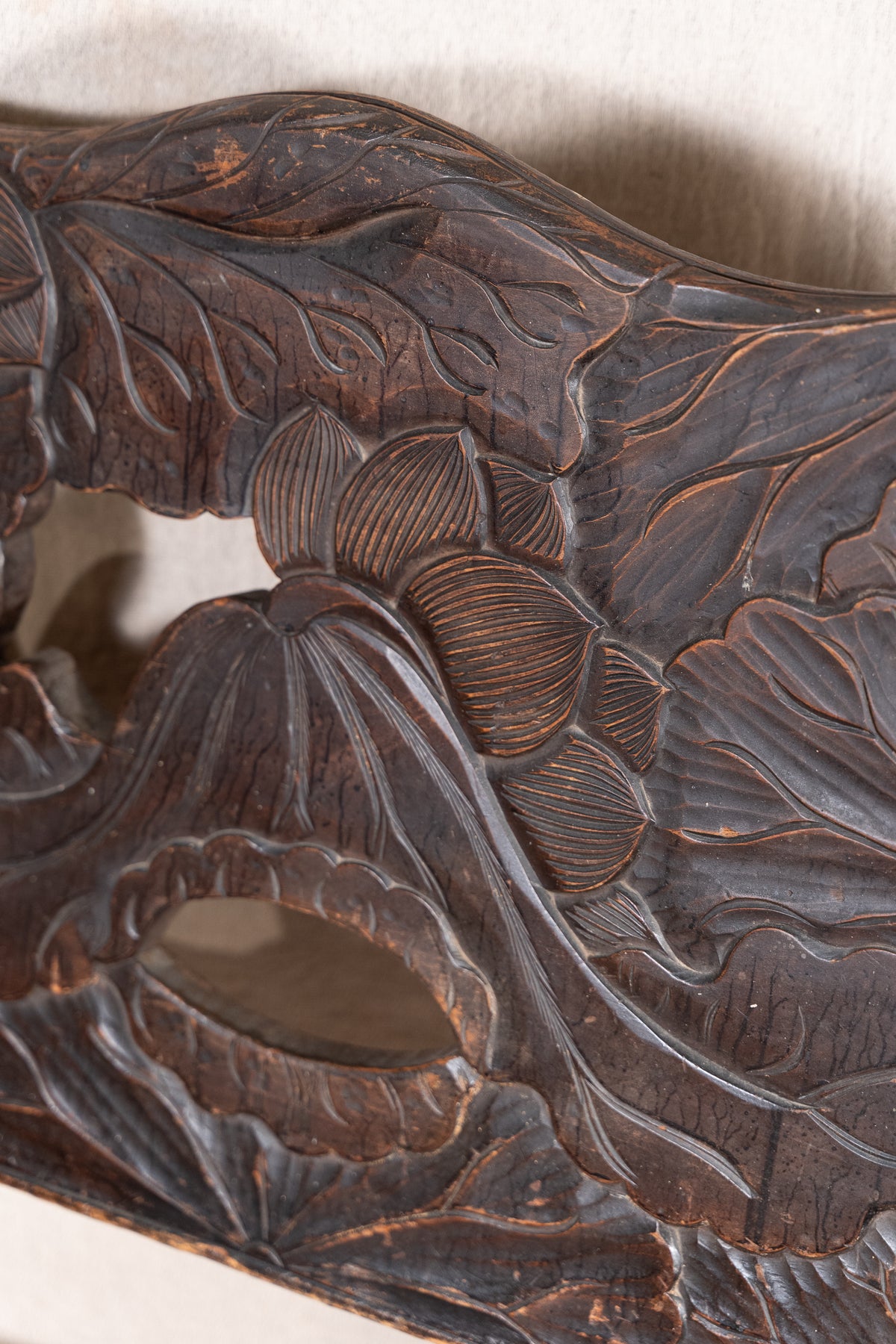 Liberty & Co. Japanese carved hardwood bench, circa 1900–1910, featuring pierced floral panels and intricate decoration from the Arts and Crafts period.