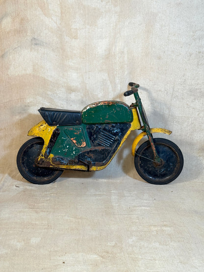 Mobo pressed steel pedal Motorcycle with yellow and green distressed paint. 