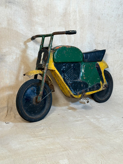 Mobo pressed steel pedal Motorcycle with yellow and green distressed paint. 