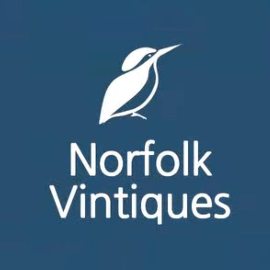 Logo of Norfolk Vintiques with a white bird illustration on a blue background