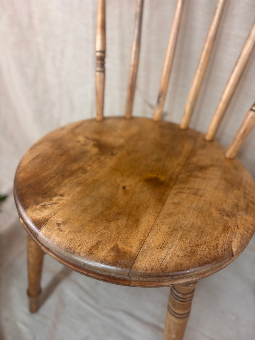 close up of a penny seat on a light background 