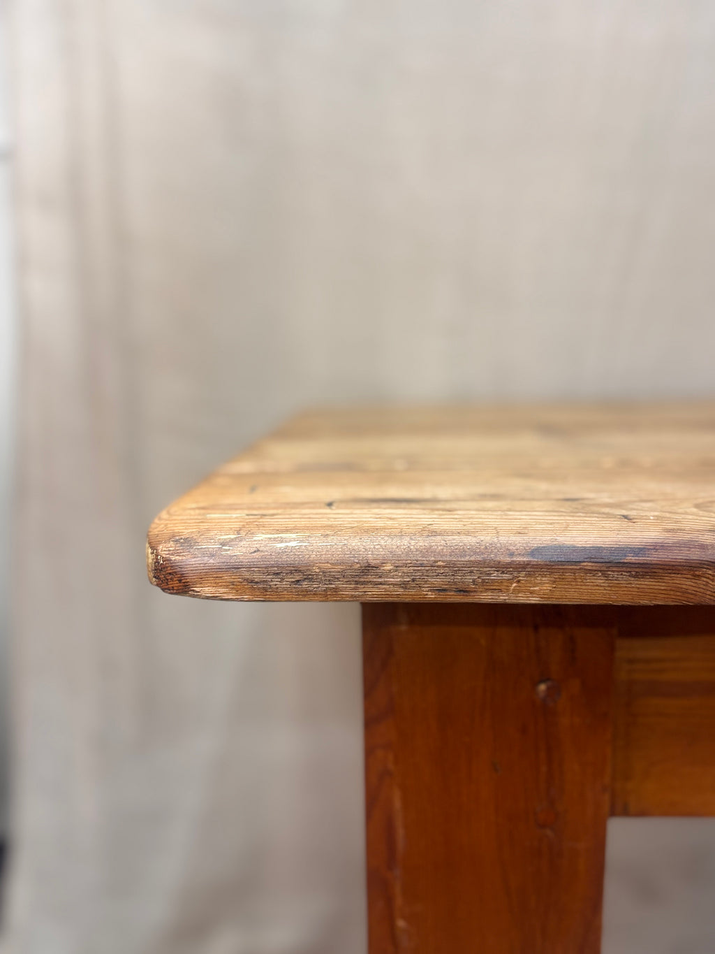 The edge of a pine table 