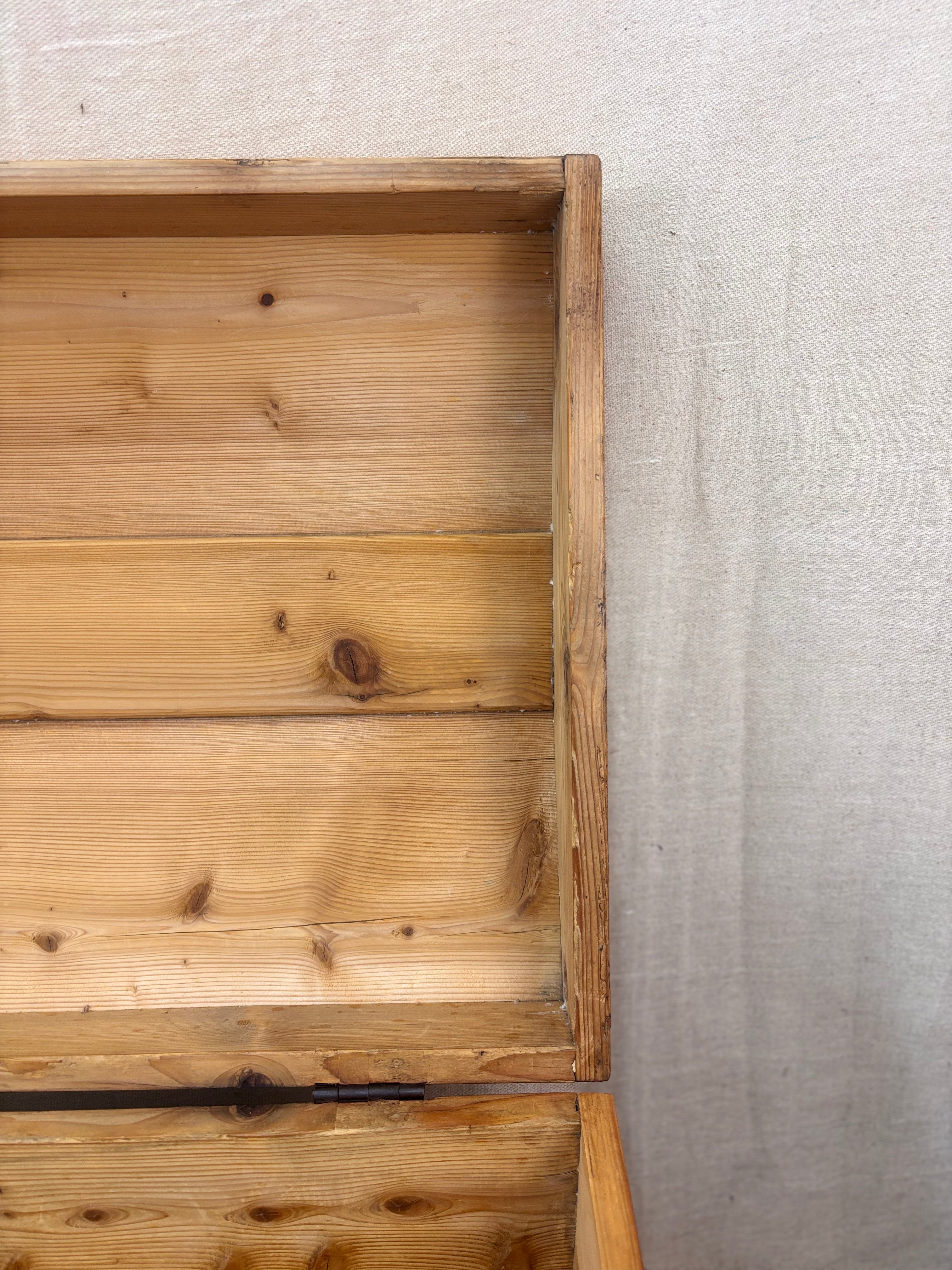 Wooden crate with a textured gray background